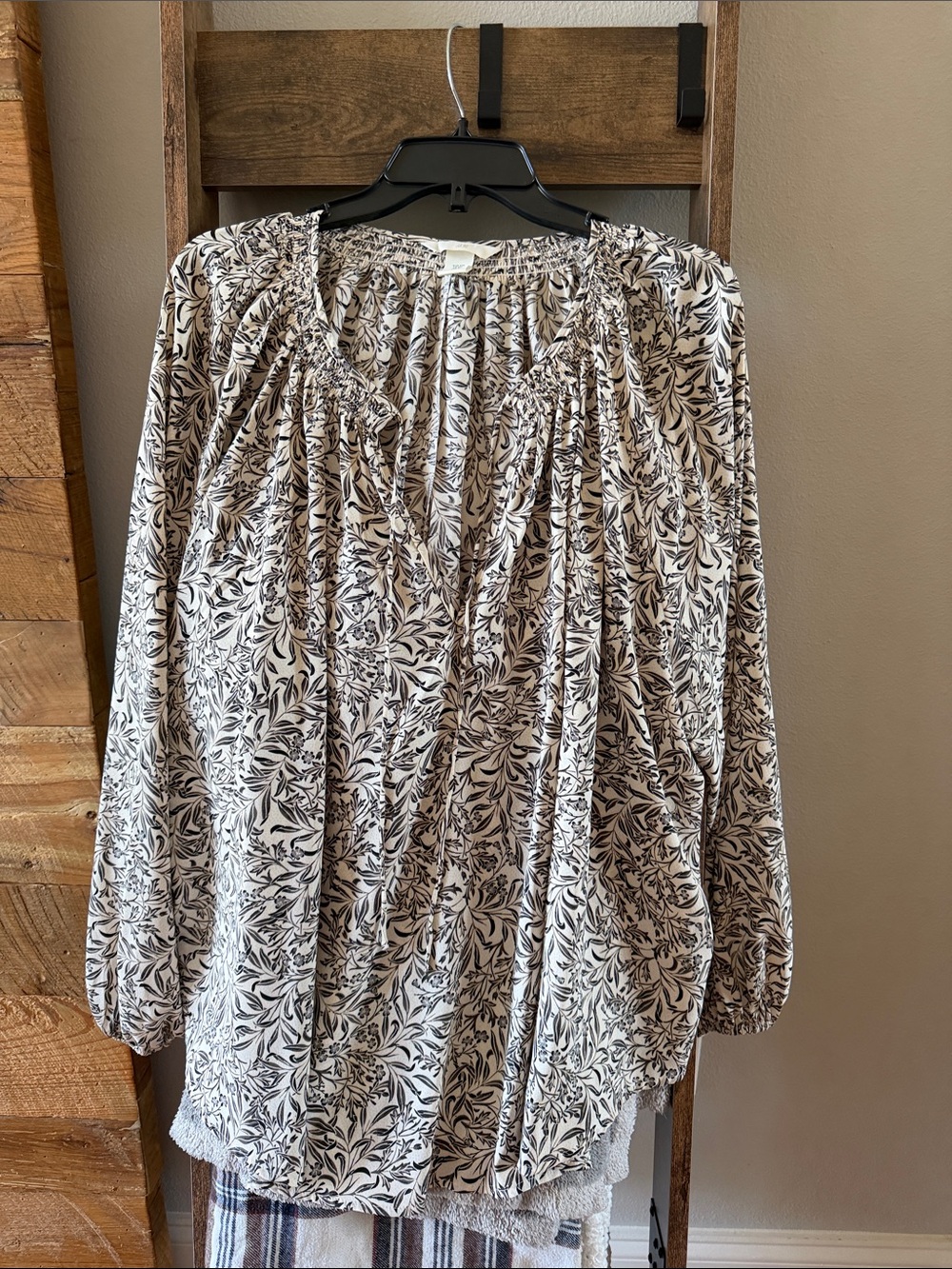 H&M Black Floral Smocked Neck Peasant Blouse on Cream
